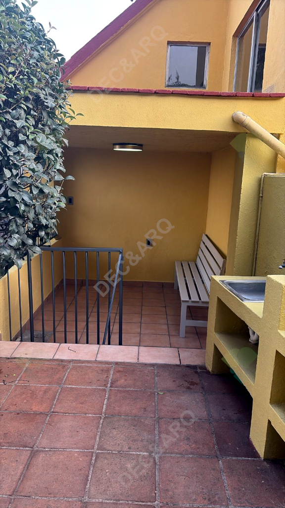 Patio con asador y tarja